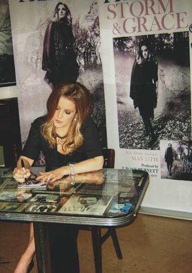 Lisa Marie Presley signing Storm & Grace